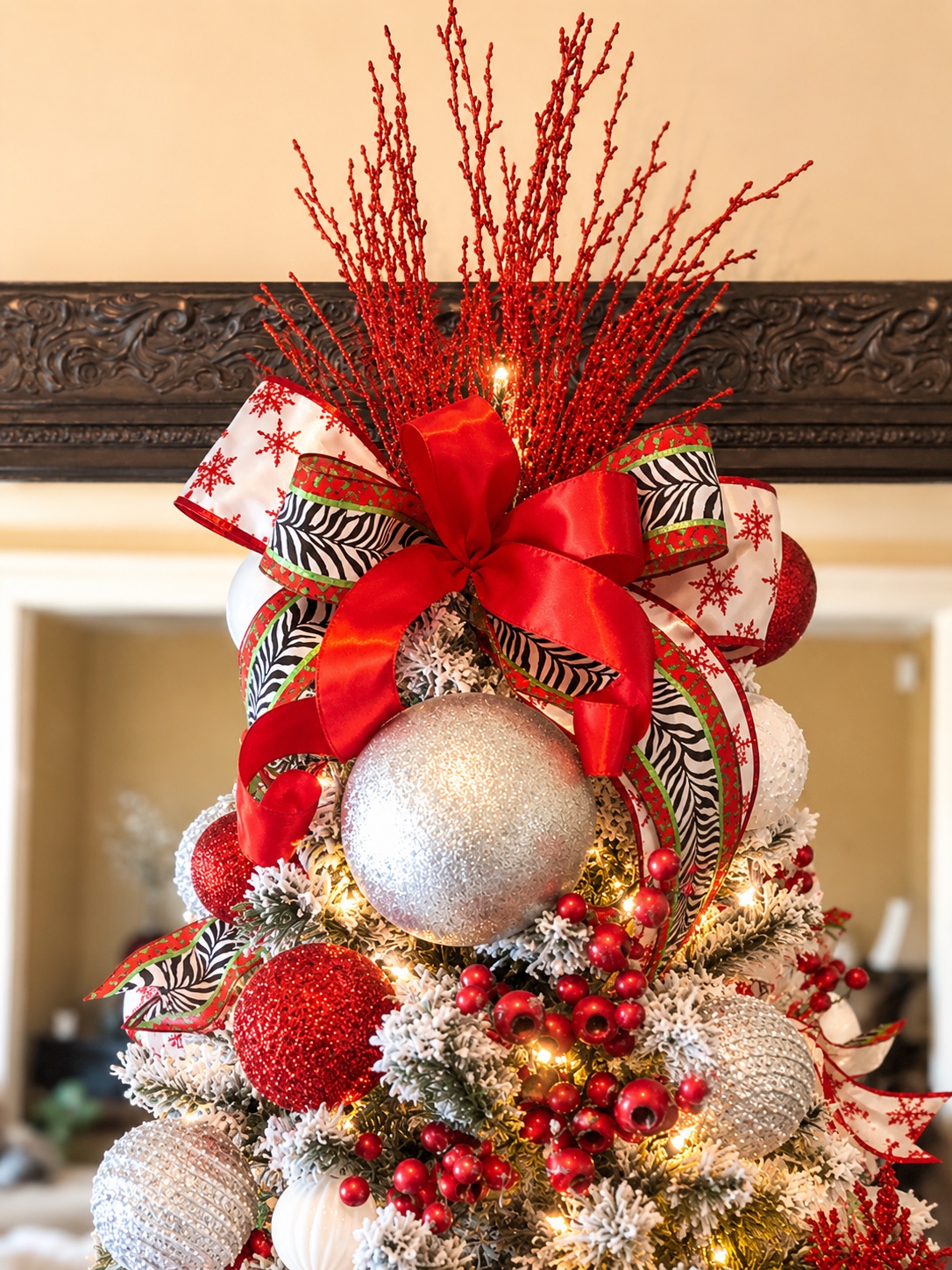 Detailed red and silver Christmas tree topper
