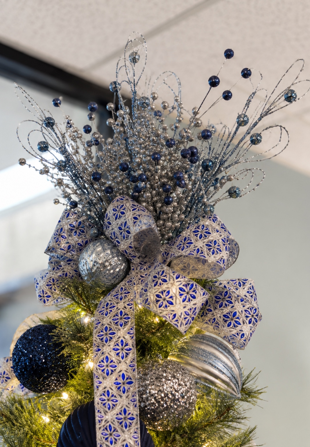 Detailed blue and silver Christmas tree topper